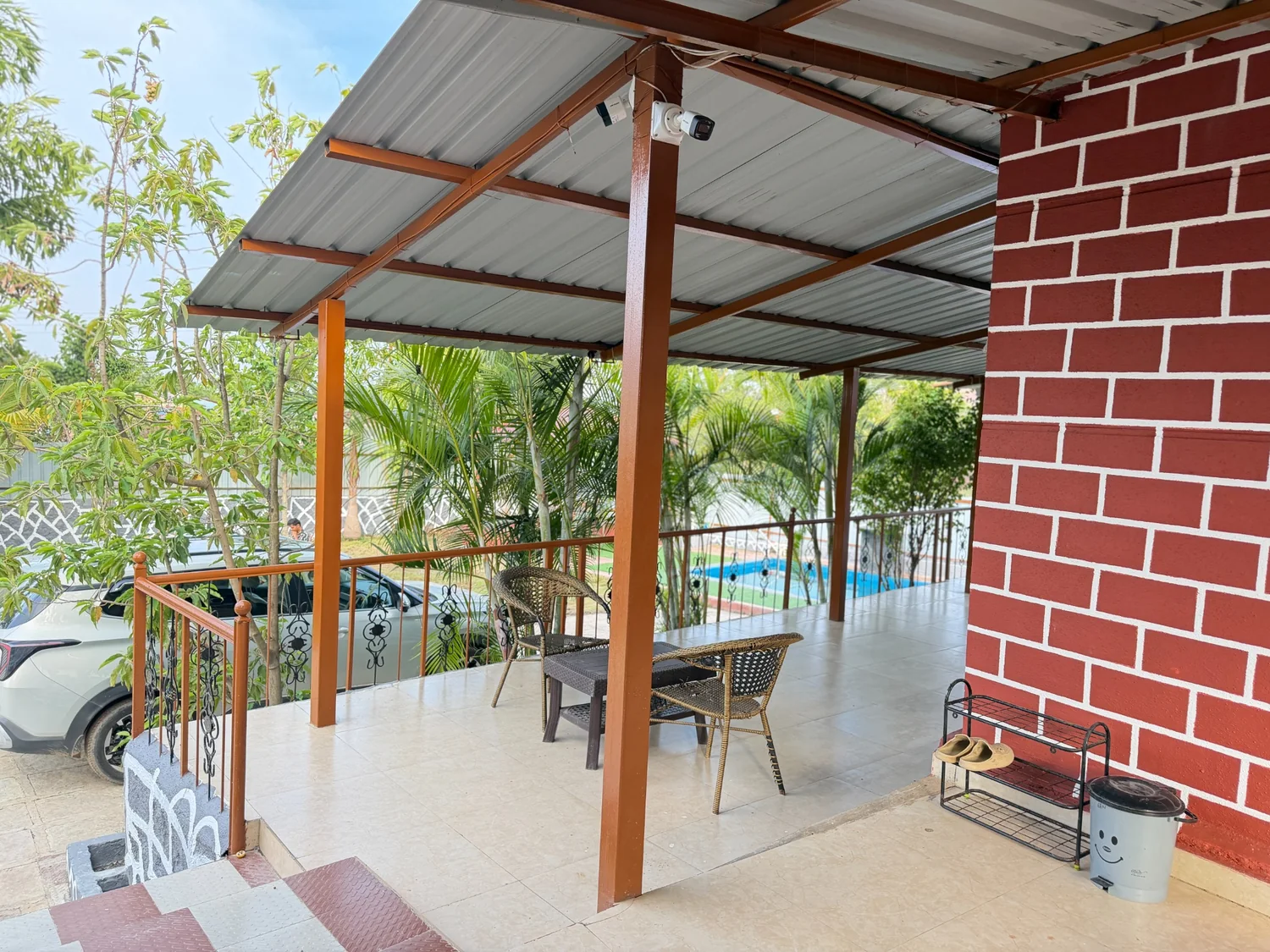Covered veranda with outdoor seating