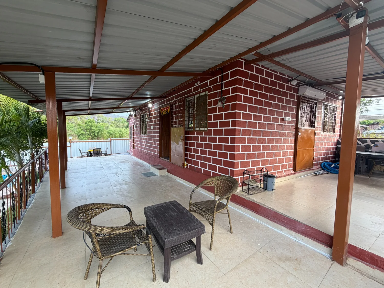 Spacious veranda and seating area outside the villa